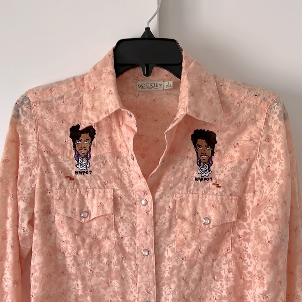 Prince fans! Must-have unique shirt with WWPD emblem.